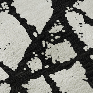 HomeRoots 8' Black And Ivory Abstract Round Rug - Washable, UV Protected, Durable Design for Modern Homes 676809