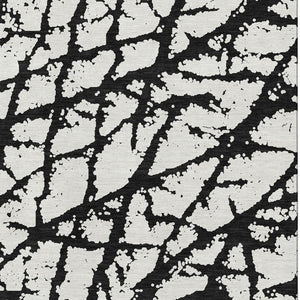 HomeRoots 9' X 12' Black And Ivory Abstract Rug - Washable, UV Protected, Durable Design for High-Traffic Areas 676811