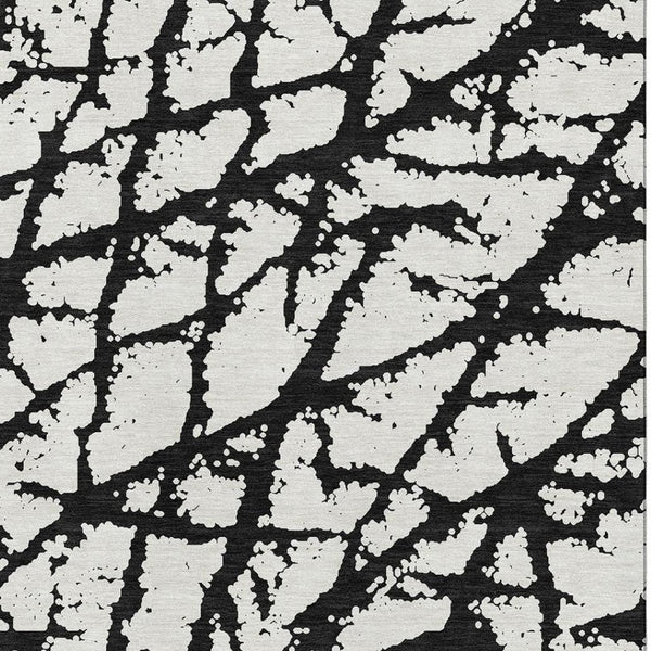 HomeRoots 9' X 12' Black And Ivory Abstract Rug - Washable, UV Protected, Durable Design for High-Traffic Areas 676811