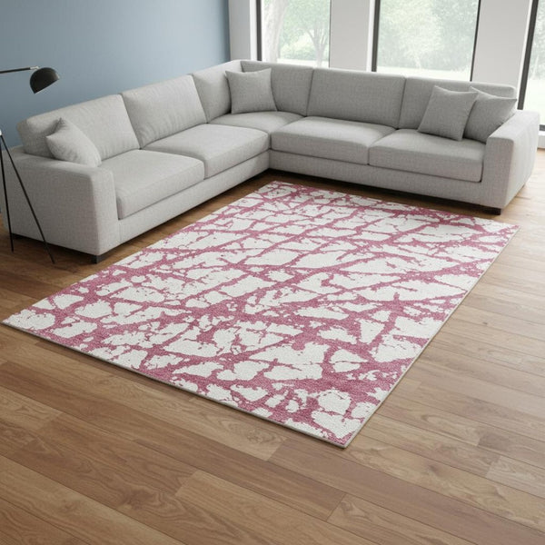 HomeRoots 8' X 10' Blush & Ivory Abstract Washable Area Rug - Durable, UV-Protected, Ideal for High-Traffic Spaces 676816