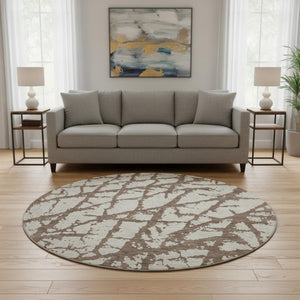 HomeRoots 8' Abstract Washable Round Area Rug in Brown and Beige - UV Protected, Stain Resistant, Easy-Care Design 676821