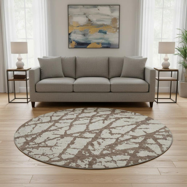 HomeRoots 8' Abstract Washable Round Area Rug in Brown and Beige - UV Protected, Stain Resistant, Easy-Care Design 676821