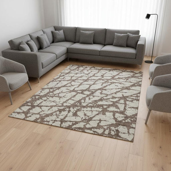 HomeRoots 10' X 14' Stylish Brown and Beige Abstract Washable Area Rug with UV Protection for Modern Spaces 676824