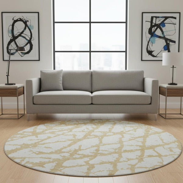HomeRoots 8' Gold And Ivory Abstract Round Rug – Washable, Stain Resistant, UV Protected for Modern Homes 676833