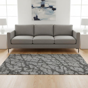 HomeRoots 5' X 8' Gray and Charcoal Abstract Area Rug – Stain-Resistant, UV Protected, Perfect for High-Traffic Spaces 676838