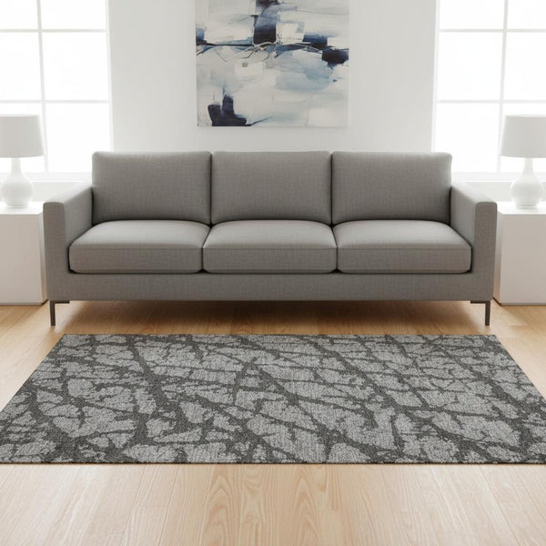 HomeRoots 5' X 8' Gray and Charcoal Abstract Area Rug – Stain-Resistant, UV Protected, Perfect for High-Traffic Spaces 676838