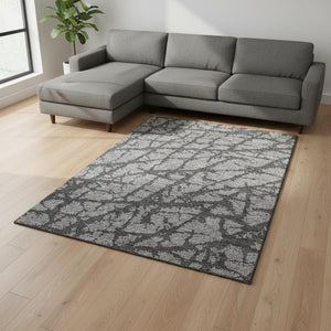 HomeRoots 10' Gray and Charcoal Abstract Washable Area Rug with UV Protection for High-Traffic Spaces 676842