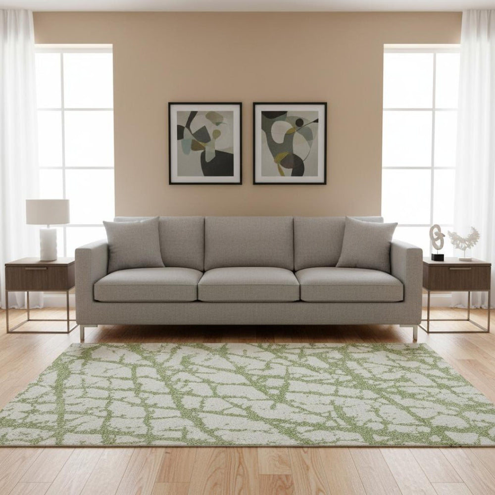 HomeRoots 5' X 8' Green And Ivory Abstract Area Rug – Stylish, Washable, UV-Protected, Durable for Every Home! 676844