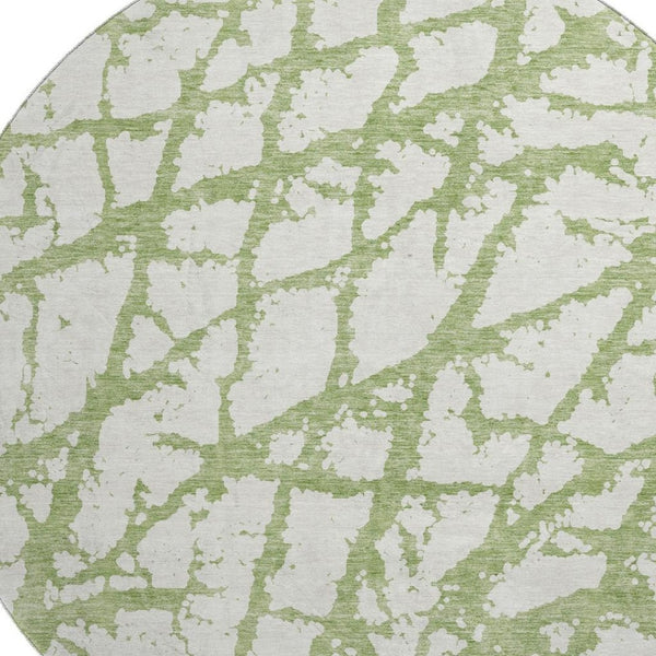 HomeRoots 8' Green and Ivory Abstract Round Rug - Washable, UV-Protected, Durable & Stylish for All Spaces! 676845