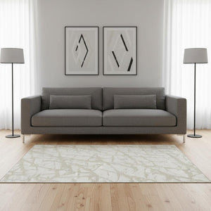 HomeRoots 5' X 8' Ivory & Beige Abstract Washable Area Rug - Durable, UV-Protected, Family-Friendly Design! 676850