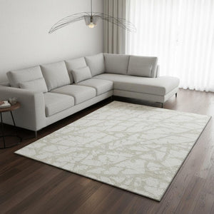 HomeRoots 8' X 10' Ivory and Beige Abstract Area Rug - Washable, UV Protected, Perfect for Family Spaces! 676852