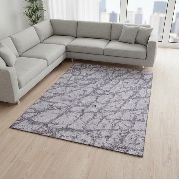 HomeRoots 10' X 14' Lavender and Beige Abstract Area Rug - Washable, UV-Protected, Pet-Friendly Design! 676860