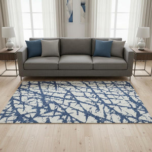 HomeRoots 5' X 8' Navy Blue & Ivory Abstract Area Rug - Stylish, Washable, UV-Protected for Modern Homes 676862