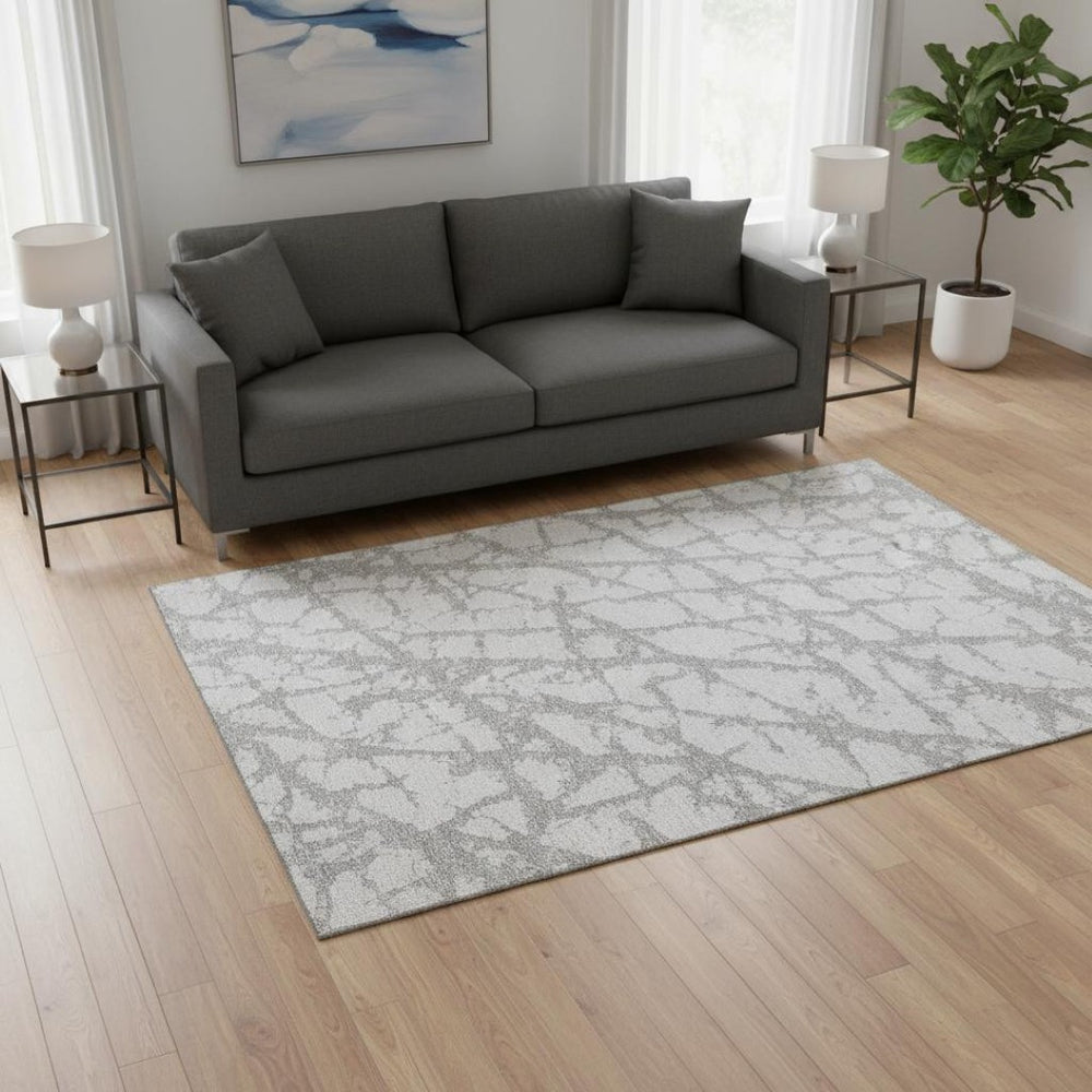 HomeRoots 5' X 8' Silver and Gray Abstract Washable Area Rug - Stylish, Durable, UV-Protected for Modern Living 676874