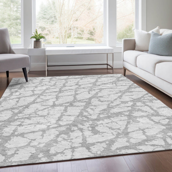 HomeRoots 10' X 14' Silver and Gray Abstract Area Rug - Washable, UV-Protected, Durable for Modern Living Spaces 676878