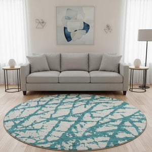 HomeRoots 8' Teal and Ivory Round Rug - Modern Abstract Design, Washable, UV Protected & Stain Resistant, 8ft 676881