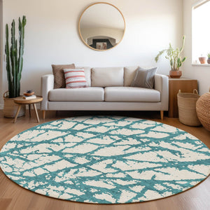 HomeRoots 8' Teal and Ivory Round Rug - Modern Abstract Design, Washable, UV Protected & Stain Resistant, 8ft 676881