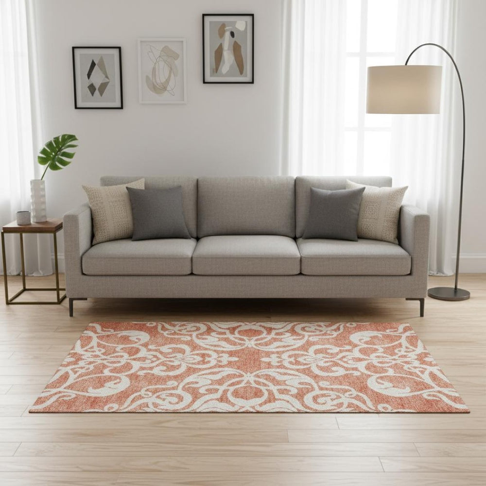 HomeRoots 5' X 8' Coral and Ivory Damask Area Rug - Washable, UV-Protected, Perfect for High-Traffic Spaces! 676910