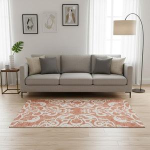 HomeRoots 5' X 8' Coral and Ivory Damask Area Rug - Washable, UV-Protected, Perfect for High-Traffic Spaces! 676910