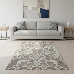 HomeRoots 5' X 8' Taupe and Ivory Damask Area Rug - Washable, UV Protected, Elegant Design for High-Traffic Spaces 676952