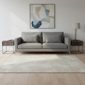 HomeRoots 5' X 8' Beige And Ivory Abstract Area Rug - Durable, Washable, UV-Protected & Ideal for High-Traffic Areas 676994