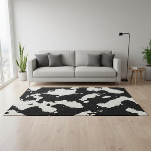 HomeRoots 5' X 8' Stylish Black & Ivory Abstract Washable Area Rug with UV Protection & Stain Resistance 677000