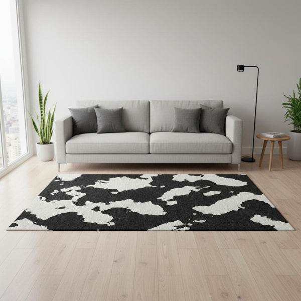 HomeRoots 5' X 8' Stylish Black & Ivory Abstract Washable Area Rug with UV Protection & Stain Resistance 677000