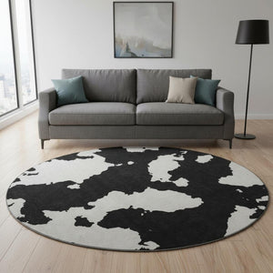 HomeRoots 8' Black And Ivory Abstract Round Rug - Stylish, Washable, UV-Protected for Modern Homes & Easy Care 677001