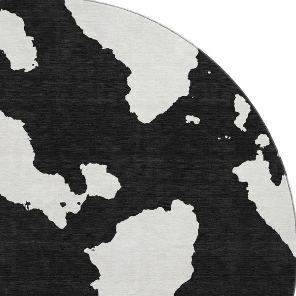 HomeRoots 8' Black And Ivory Abstract Round Rug - Stylish, Washable, UV-Protected for Modern Homes & Easy Care 677001