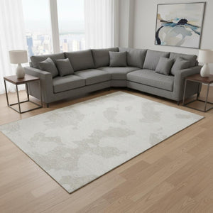 HomeRoots 8' X 10' Ivory and Beige Abstract Area Rug – Washable, UV-Protected, Modern Design for Any Room 677038