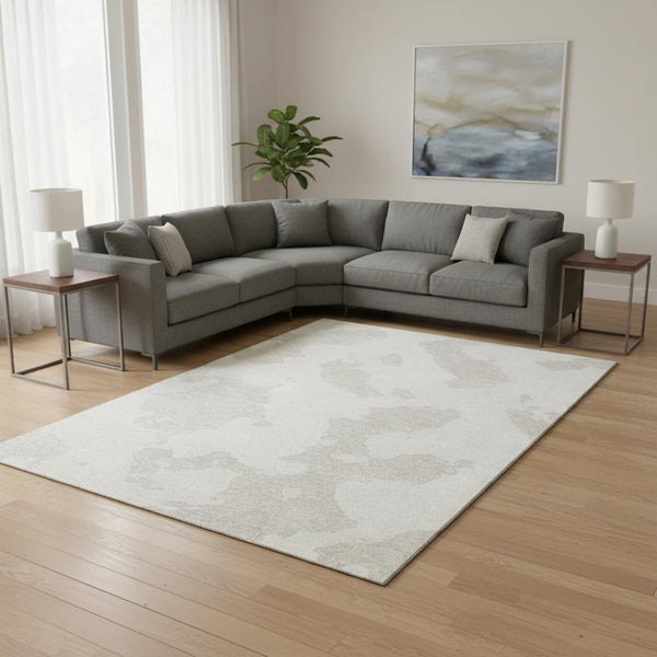 HomeRoots 9' X 12' Ivory and Beige Abstract Washable Area Rug with UV Protection – Stylish, Durable & Easy Care! 677039