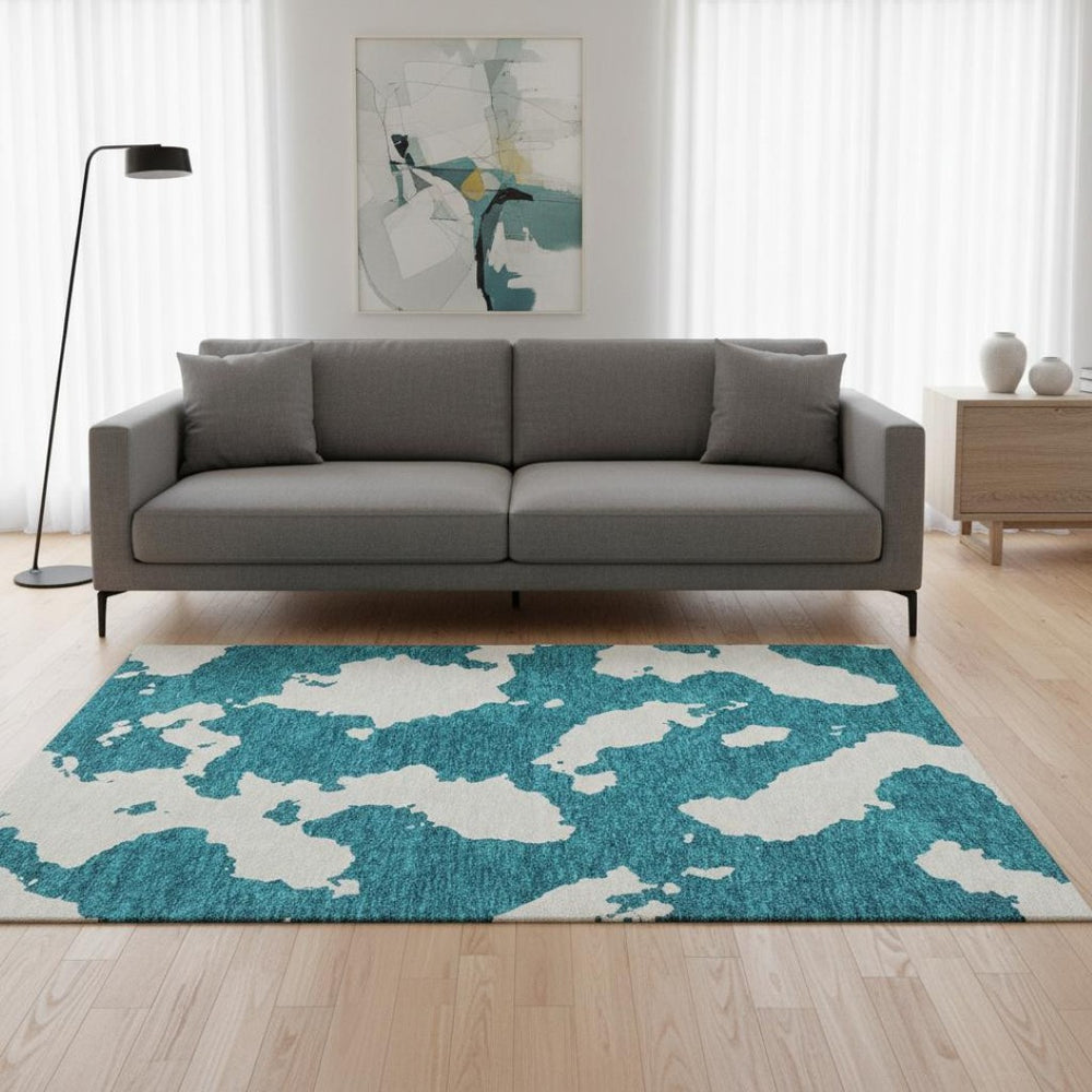 HomeRoots 5' X 8' Teal And Ivory Abstract Area Rug - Washable, UV Protected & Ideal for Homes with Kids & Pets 677054