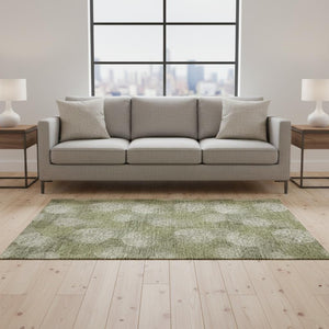 HomeRoots 5' X 8' Green And Ivory Abstract Area Rug - Washable, UV-Protected, Durable for High-Traffic Spaces 677173