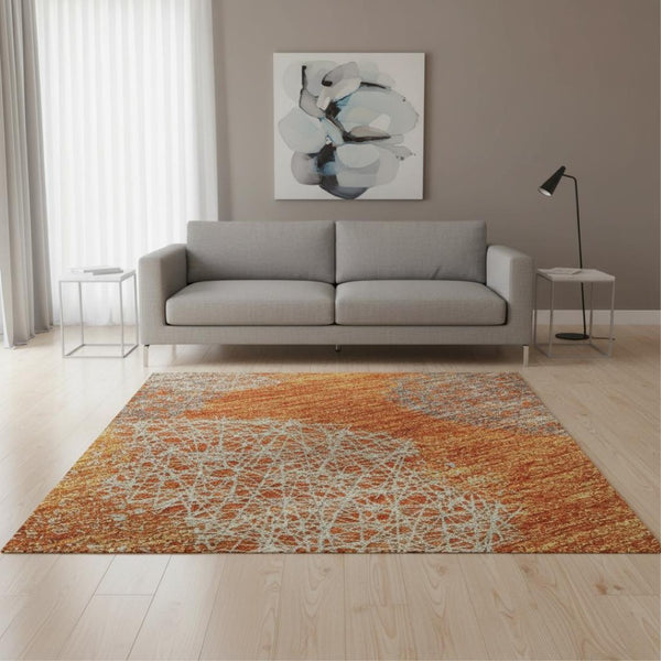 HomeRoots 5' X 8' Vibrant Orange Gray Silver Abstract Area Rug - Washable, UV Protected, Perfect for High-Traffic Areas 677179