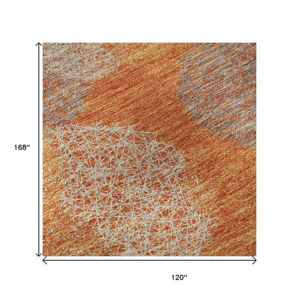 HomeRoots 10' X 14' Washable Area Rug in Orange, Gray & Silver - Modern Abstract Design with UV Protection 677183