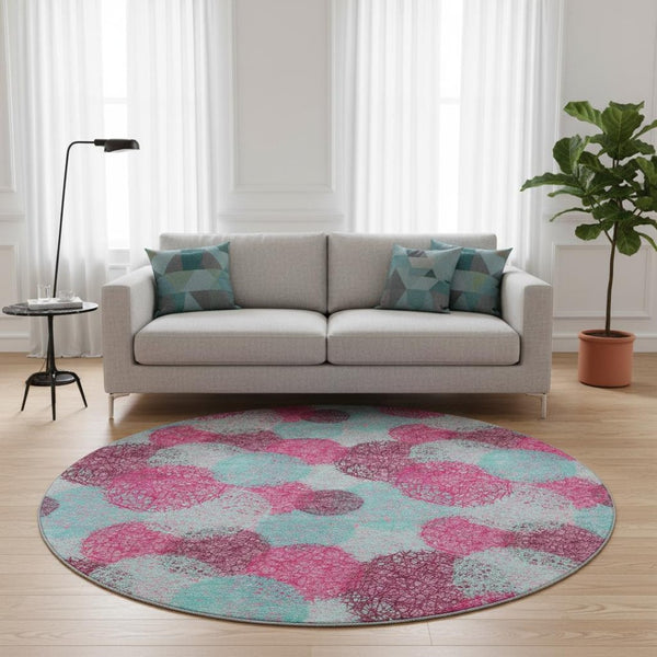 HomeRoots 8' Vibrant Pink, Teal & Burgundy Abstract Round Rug - Washable, UV-Protected, Durable & Stylish Decor 677186
