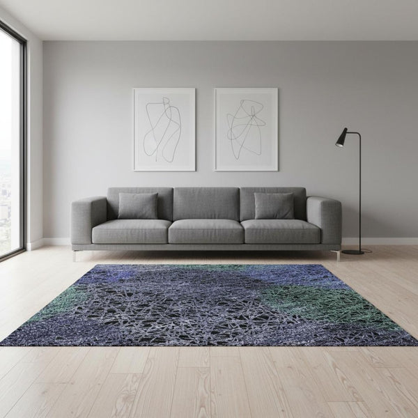 HomeRoots 5' X 8' Abstract Purple and Green Washable Area Rug with UV Protection for Stylish Living Spaces 677191
