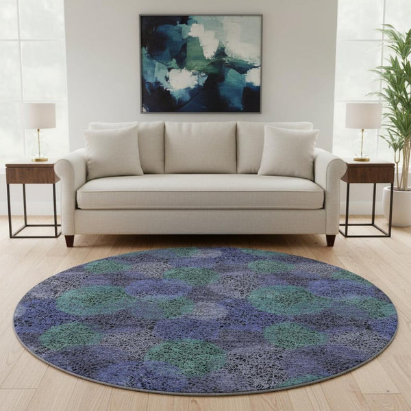 HomeRoots 8' Stunning Purple and Green Abstract Washable Round Rug with UV Protection for Active Homes 677192