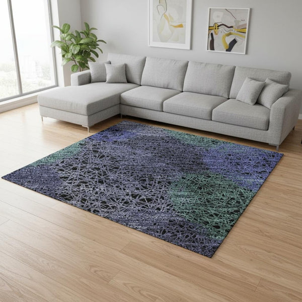 HomeRoots 9' X 12' Vibrant Purple and Green Abstract Washable Area Rug with UV Protection for Busy Homes 677194
