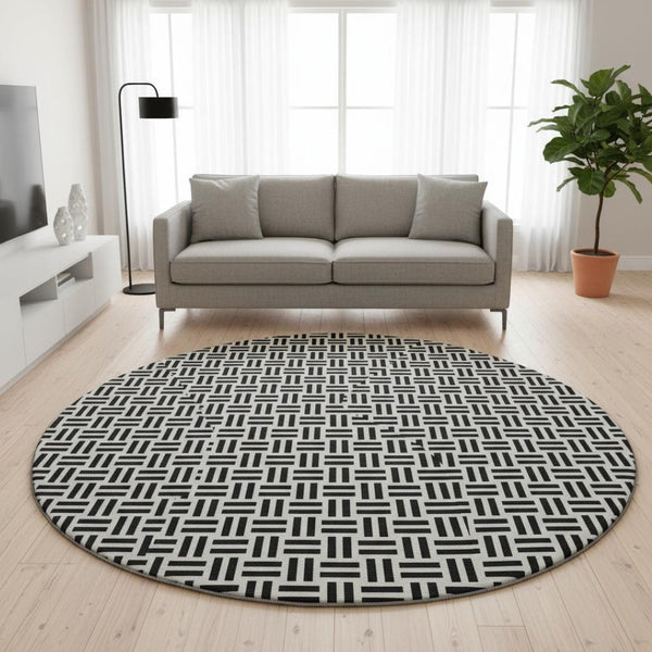HomeRoots 8' Black And Ivory Geometric Round Rug - Washable, UV Protected, Durable, Ideal for Busy Homes 677216