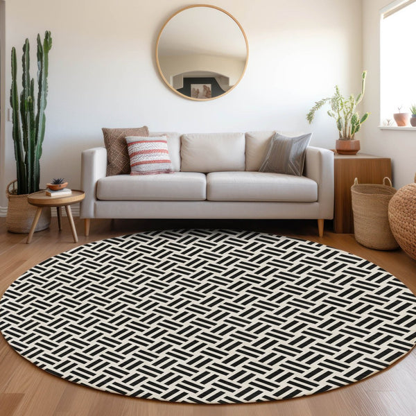 HomeRoots 8' Black And Ivory Geometric Round Rug - Washable, UV Protected, Durable, Ideal for Busy Homes 677216