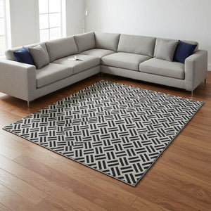 HomeRoots 8' X 10' Washable Black And Ivory Geometric Area Rug With UV Protection For Modern Homes & Families 677217