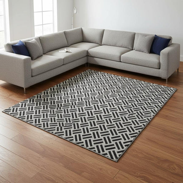 HomeRoots 8' X 10' Washable Black And Ivory Geometric Area Rug With UV Protection For Modern Homes & Families 677217