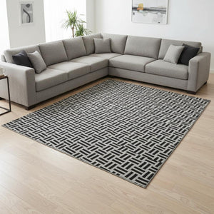 HomeRoots 9' X 12' Modern Black And Ivory Geometric Area Rug - Washable, UV Protected, Durable & Stylish Decor 677218
