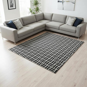 HomeRoots 10' Black and Ivory Geometric Washable Area Rug - UV Protection, Durable, Perfect for Families & Pets 677219