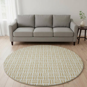 HomeRoots 8' Gold and Ivory Geometric Round Rug - Washable, UV-Protected, Durable for Modern Living Spaces 677240