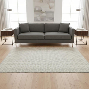 HomeRoots 5' X 8' Ivory and Beige Geometric Area Rug - Stylish, Washable, UV-Protected, Perfect for High-Traffic Spaces 677251