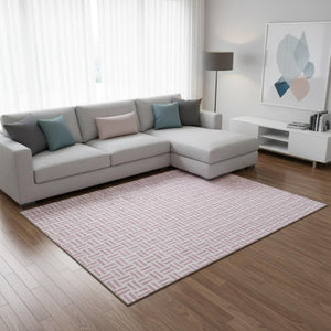 HomeRoots 8' X 10' Pink And Ivory Geometric Area Rug - Washable, UV Protected, Stylish for Homes & Families 677265
