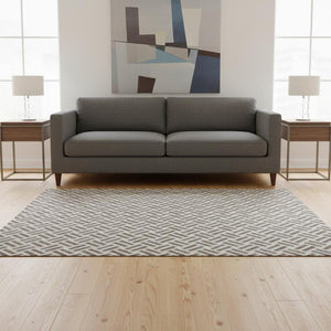 HomeRoots 5' X 8' Taupe & Ivory Geometric Area Rug – Washable, Durable, UV-Protected for Modern Living Spaces 677275
