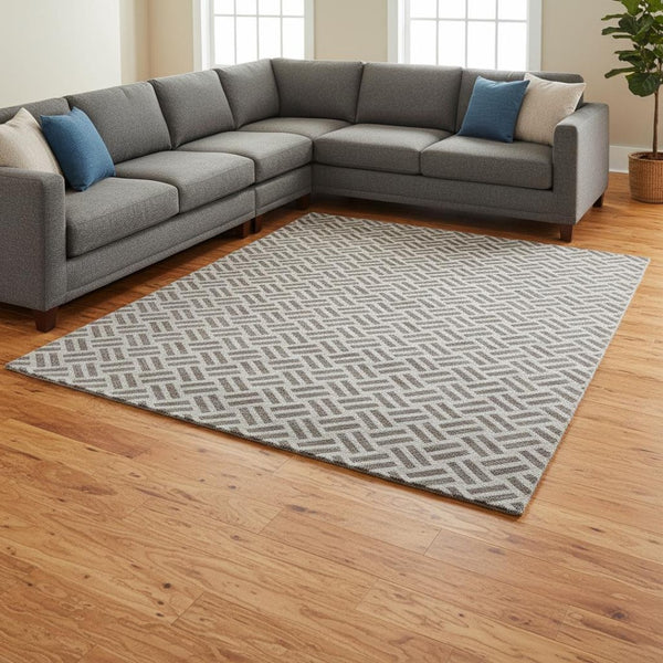 HomeRoots 8' X 10' Taupe And Ivory Geometric Area Rug – Washable, UV Protected, Ideal for Families & Pets 677277